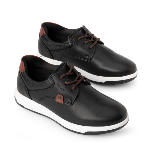 Zapato tipo choclo casual en color negro y coñac para Niño Yuyin 26070